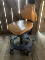 Arztstuhl Sirona höhenverstellbar orange