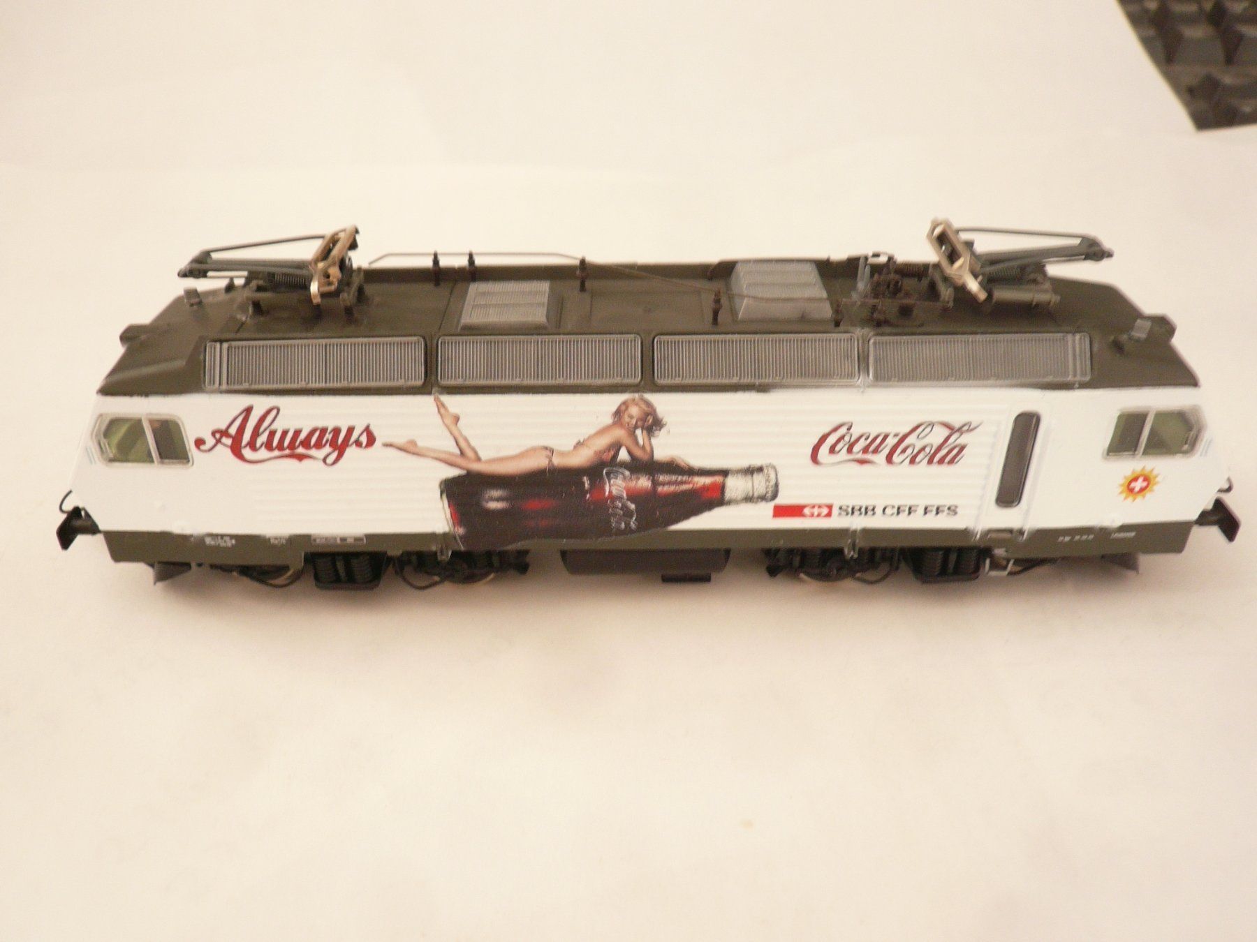 Roco Modelleisenbahnen: ROCO H0 RE 4/4 IV " COCA COLA WEISS " NEUWERTIG ODER NEU – Neu (gemäss Beschreibung) aus Pfaffnau von nolff