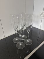 4 champagne glasses