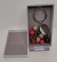 Porte clef-bijou de sac Cacharel