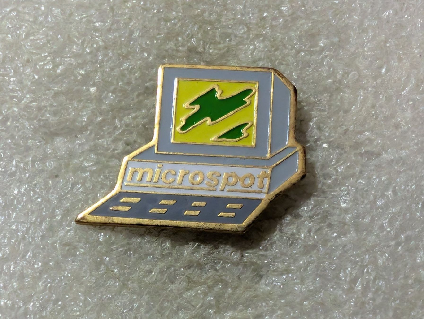 Placchette & Badge: Ansteckpin 100: Microspot – Usato da Oppligen venduto da Pin-Fall-Shop