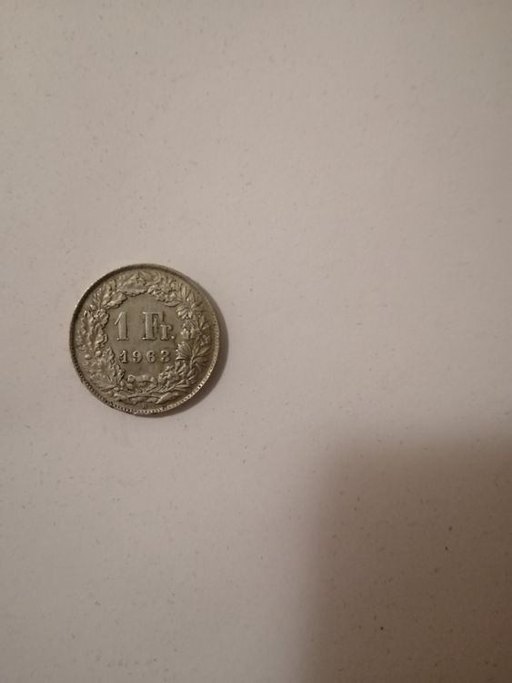1 franc Suisse 1963 B patinée, usure comme sur la photo 1