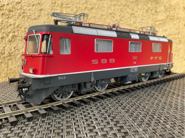 Hermann Modellini di ferrovie: Re 4/4 rot Hermann – Nuovo e nell'imballaggio originale da Schlieren venduto da Kasimir19