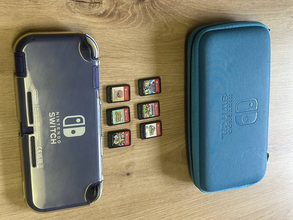 Consoles: Nintendo Switch Lite + 6 Spiele + Tasche – D'occasion à Luzern par Wilson019 1