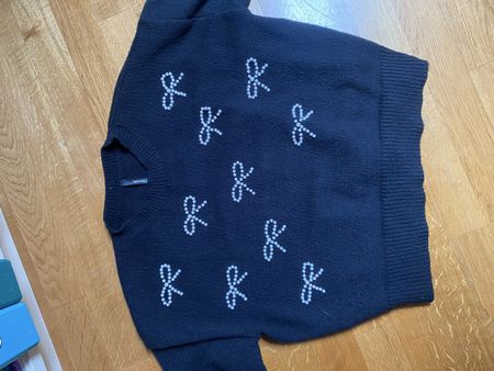 Pull Chicorée noir taille M, décoré de noeuds en perles