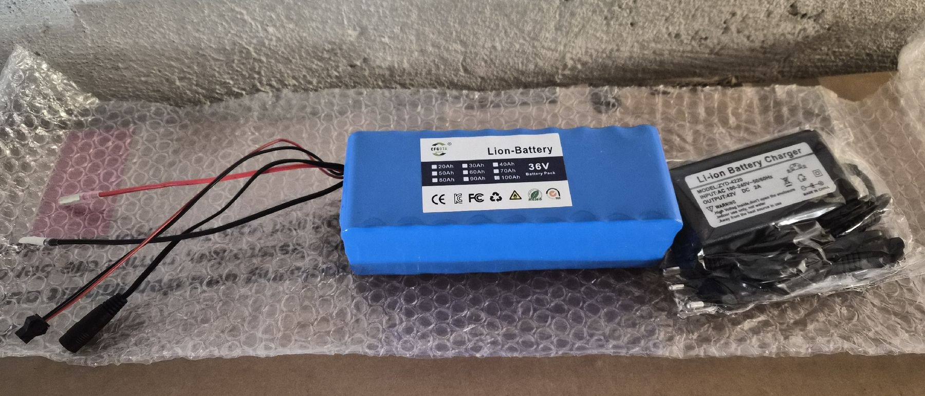 Akkus: 36V Batterie-Kit mit Ladegerät – NEU – Neu und originalverpackt aus Bern von Free-zone