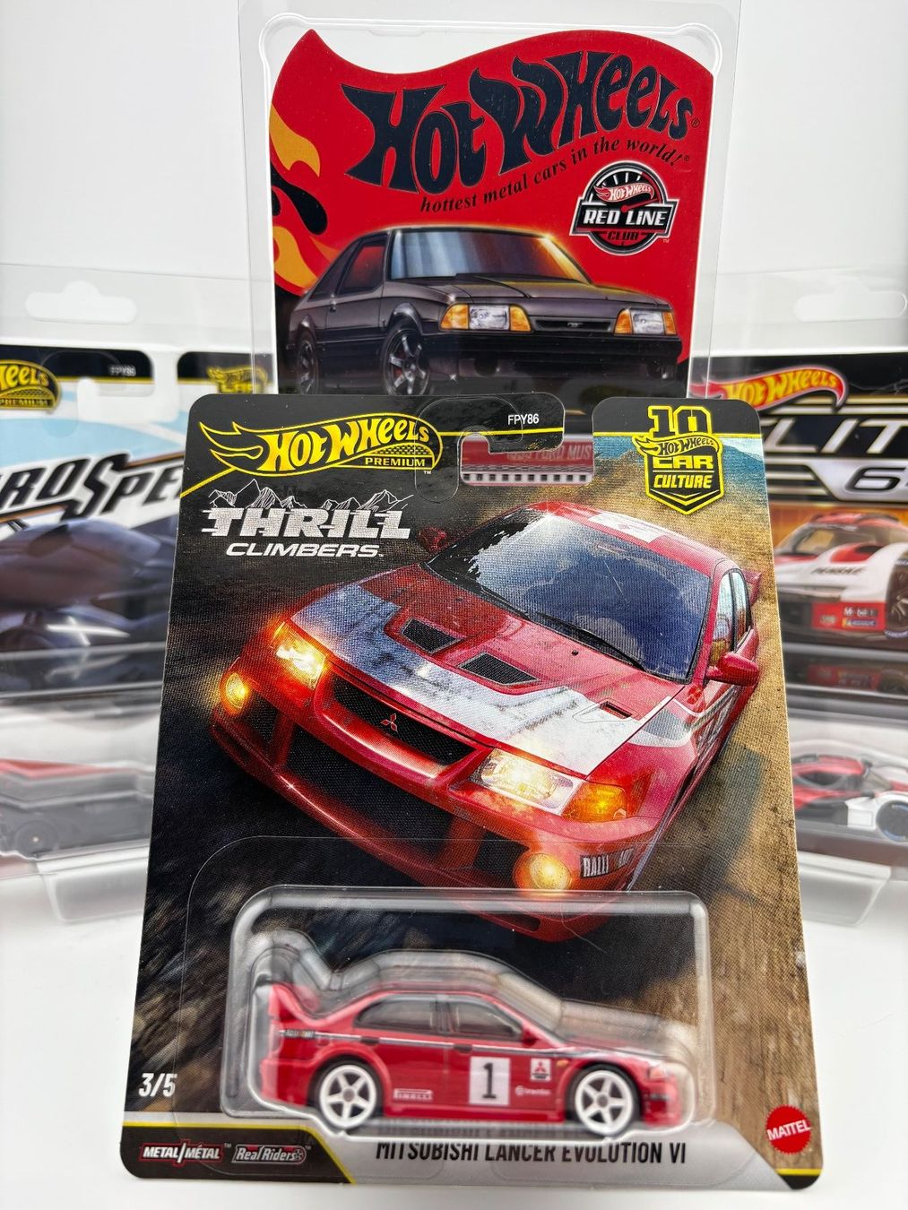 Hot Wheels Modellini d'auto: Hot Wheels Mitsubishi Lancer Evolution VI Thrill Climbers – Nuovo e nell'imballaggio originale da Flawil venduto da HeisseReifen