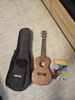 Ukulele mit Tragtasche und Buch mit Anleitungen