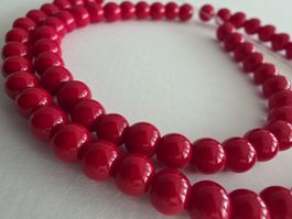 Perlen rot (wie Korallen) Glas 6mm. Strang