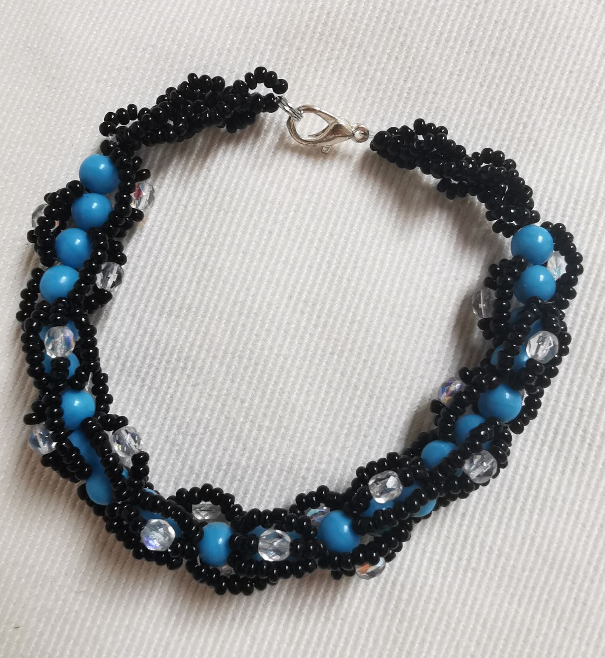 Bracciali & Braccialetti: Handgemachte Armkette, schwarz-türkis – Nuovo (secondo la descrizione) da Obergerlafingen venduto da Sigus