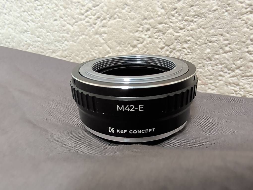 Adattatori foto: Adaptateur objectif M42 à caméra Sony E – Usato da Collombey venduto da dan_kf9j 1