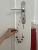 Kette aus Metall und Holz, Made in Finland