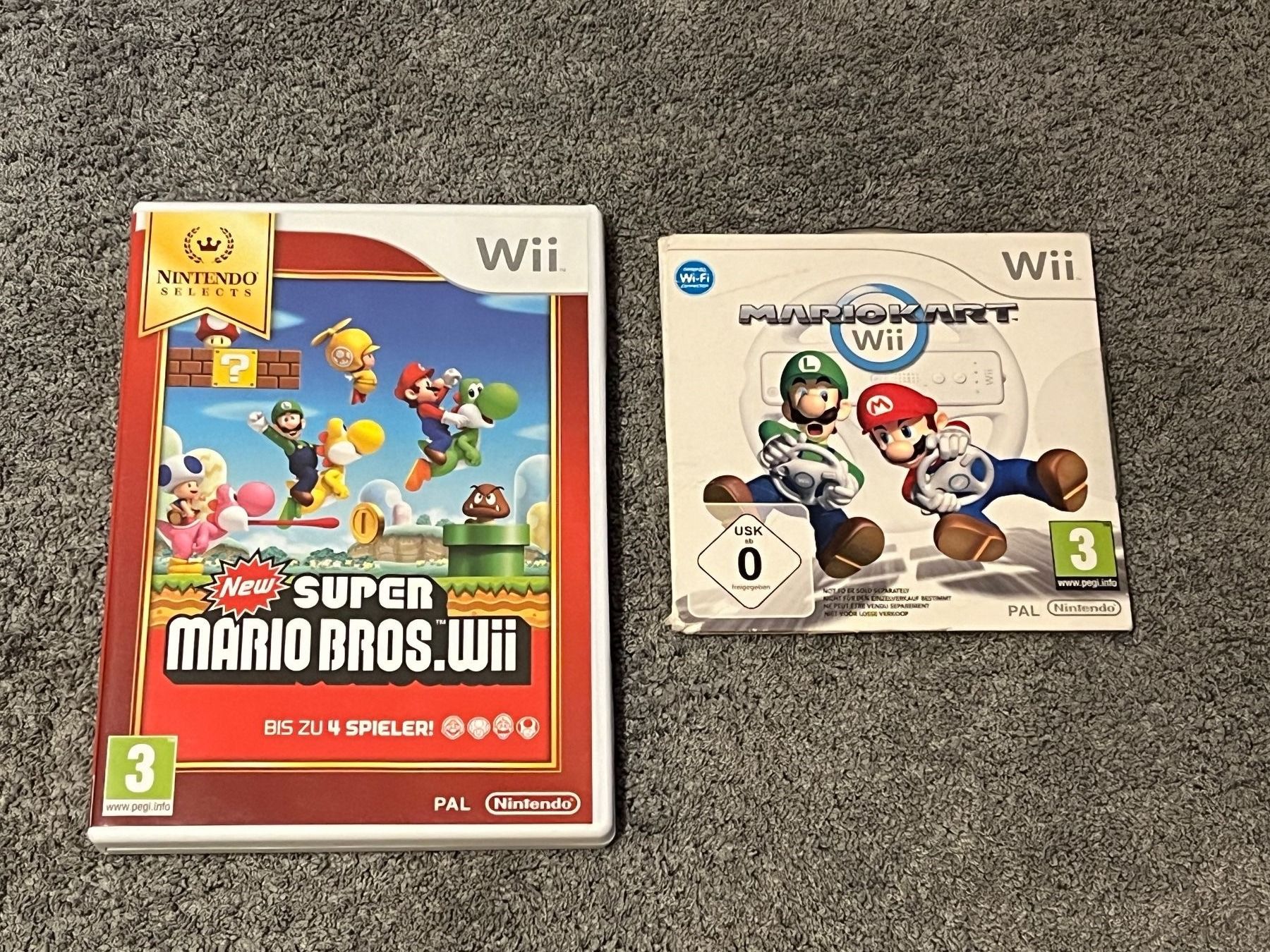 Nintendo Konsolen: Console Nintendo Wii + 2 jeux – Gebraucht aus Murist von  3