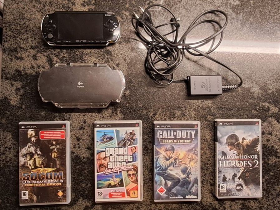 Sony PlayStation Portable (PSP) inkl. 4 Spielen (Gebraucht) in Wabern ...