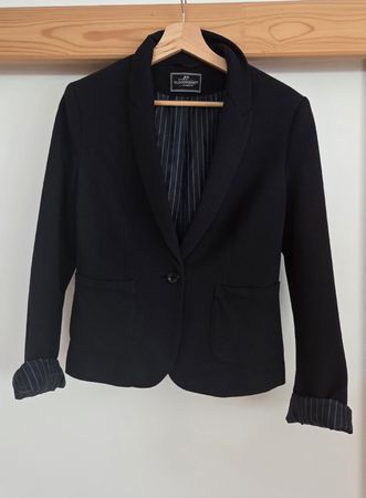 Veste marine femme taille 40 état neuf