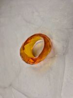 Bague en ambre baltique avec facètes