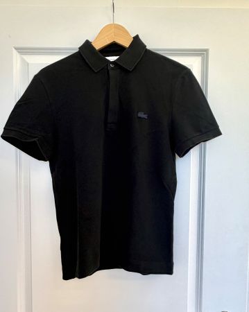 Polo noir Lacoste légèrement stretch
