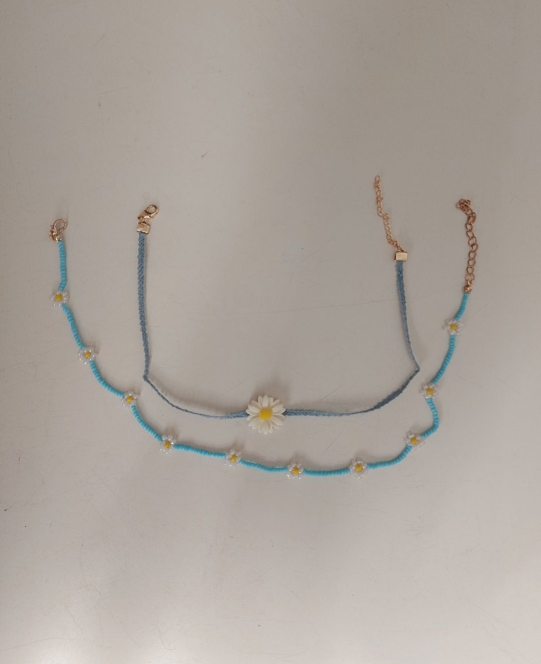 Altri gioielli: Lot de colliers bleus à marguerites – Nuovo (secondo la descrizione) da Le Mont-Pèlerin venduto da jux_x96b