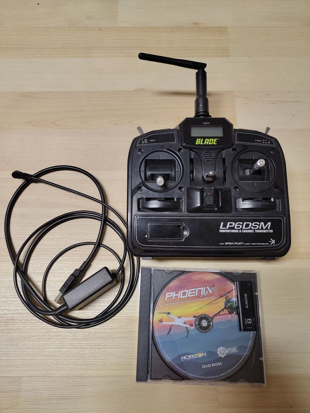 Modellismo RC: Phoenix R/C 6 Simulator mit LP6DSM Fernsteuerung – Usato da Obfelden venduto da Guex0