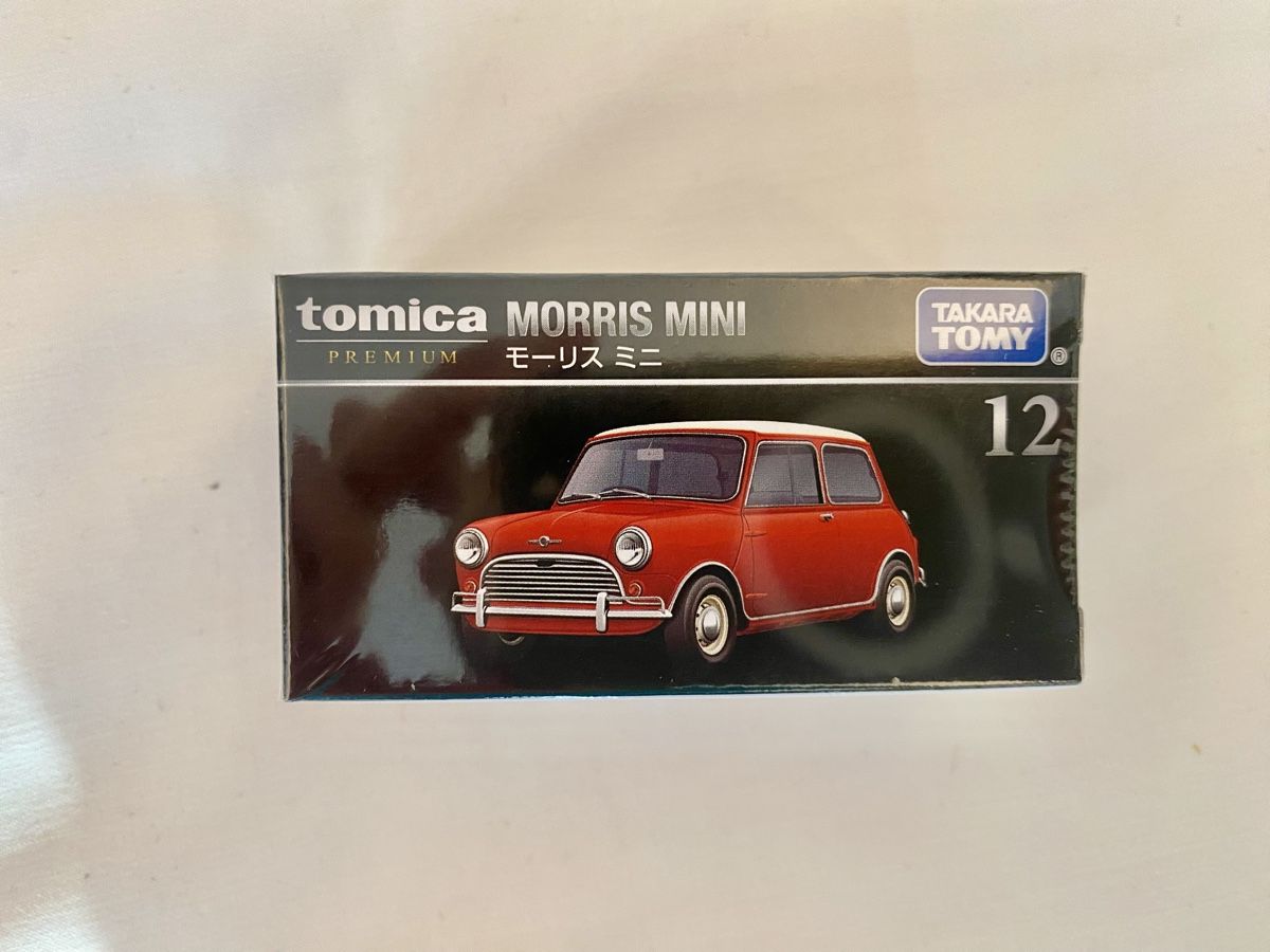 Cooper Modellini d'auto: Tomica Premium 12 Morris Mini Cooper, Massstab 1:50 – Nuovo e nell'imballaggio originale da Oberembrach venduto da theZaz