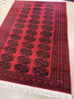 Teppich rot-schwarz gemustert mit Fransen ca. 282x191cm