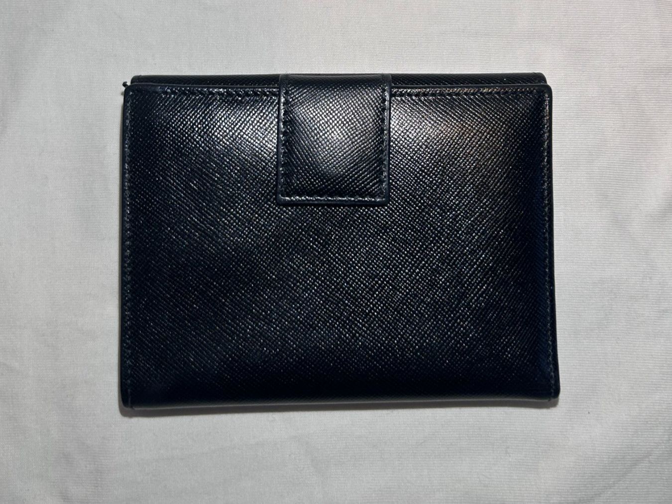 Prada Portafogli: Prada Saffiano Leather Black Fold Wallet – Usato da Zürich venduto da Mr.Elle 1