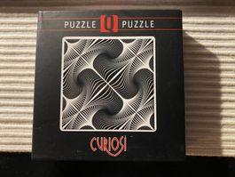 Puzzle Curiosi Design / 79 Pièces