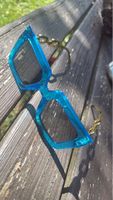 Sonnenbrille Damen blau quadratisch Kettendesign
