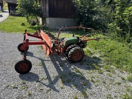 Rapid 505 mit Bandrechen und Messerbalken