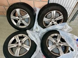 4 Original Peugeot Felgen mit Sommerreifen zu verkaufen
