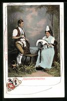 Paar in Appenzeller Tracht vor einer Lan