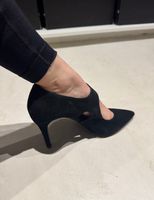 Escarpins noirs en daim