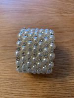 Joli bracelet avec perles blanches