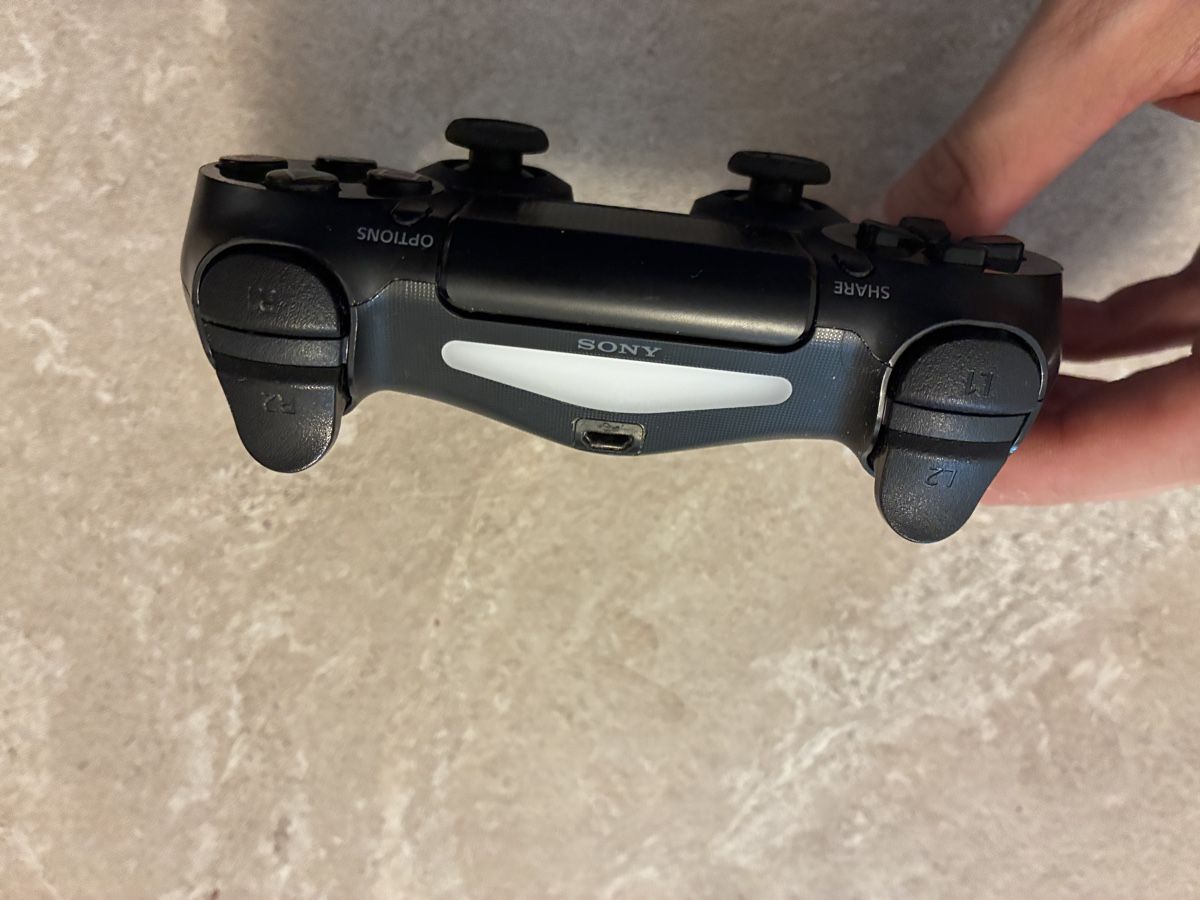 Sony Controller: Controller Sony PlayStation 4 schwarz gebraucht – Usato da Zürich venduto da R1908 1