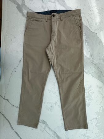 Pantalon Chino homme Tommy Hilfiger beige coupe slim 36/32