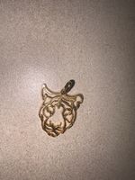 Pendentif tête de tigre neuf bon état