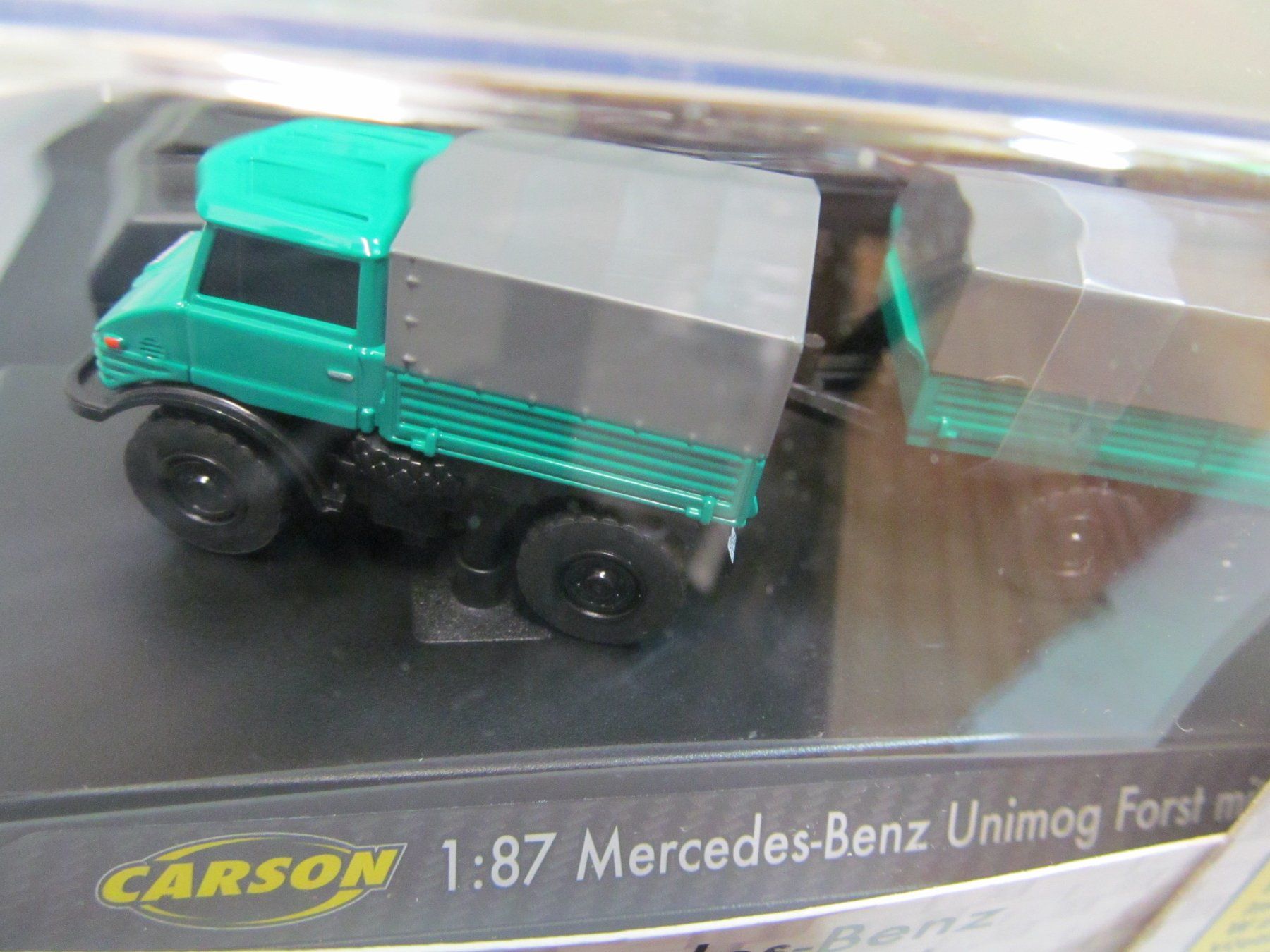 Unimog Modellini d'auto: UNIMOG FORST MIT ANHÄNGER  DIGITAL  1:87  CARSON – Nuovo e nell'imballaggio originale da Grueningen venduto da malamut56
