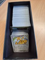 Pokémon Sammelkarten Konvolut im schwarzen Karton