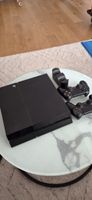 Sony PlayStation 4 Slim Konsole mit Controllern