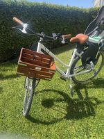 Frauenvelo mit Thule Kindersitz  28 Zoll