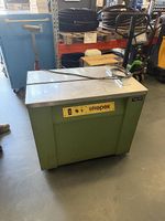 Machine à cercler les cartons 