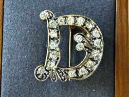 Vintage-Brosche mit Initiale D goldfarben mit Strass.