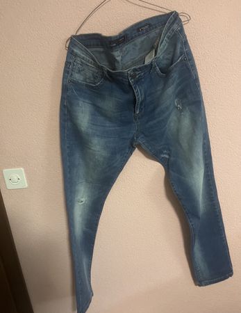 Jeans da uomo blu usati, perfetti per la stagione! Taglia 34