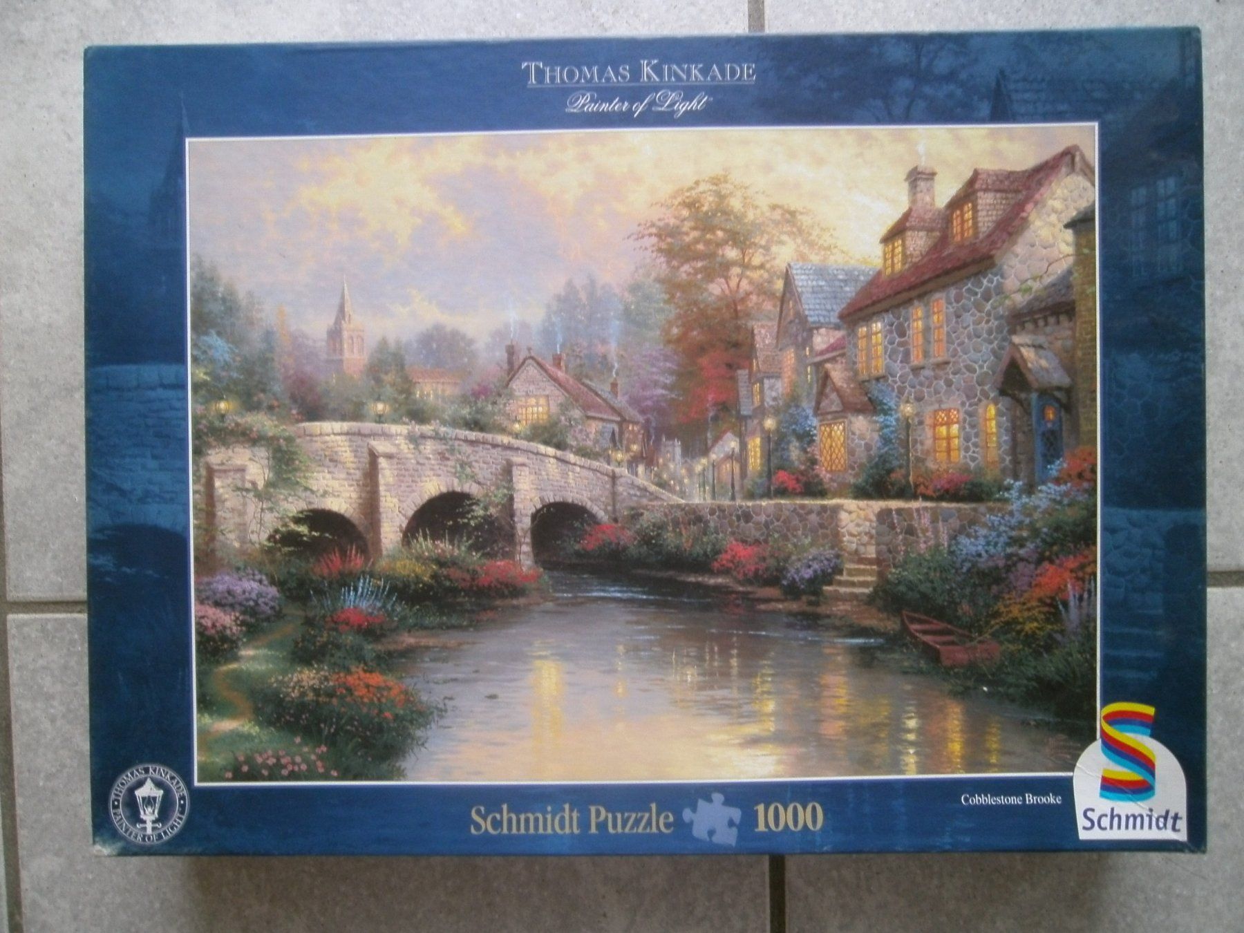 Puzzles: Puzzle Schmidt " Thomas Kinkade " 1000 pces – D'occasion à Moutier par Mouschka