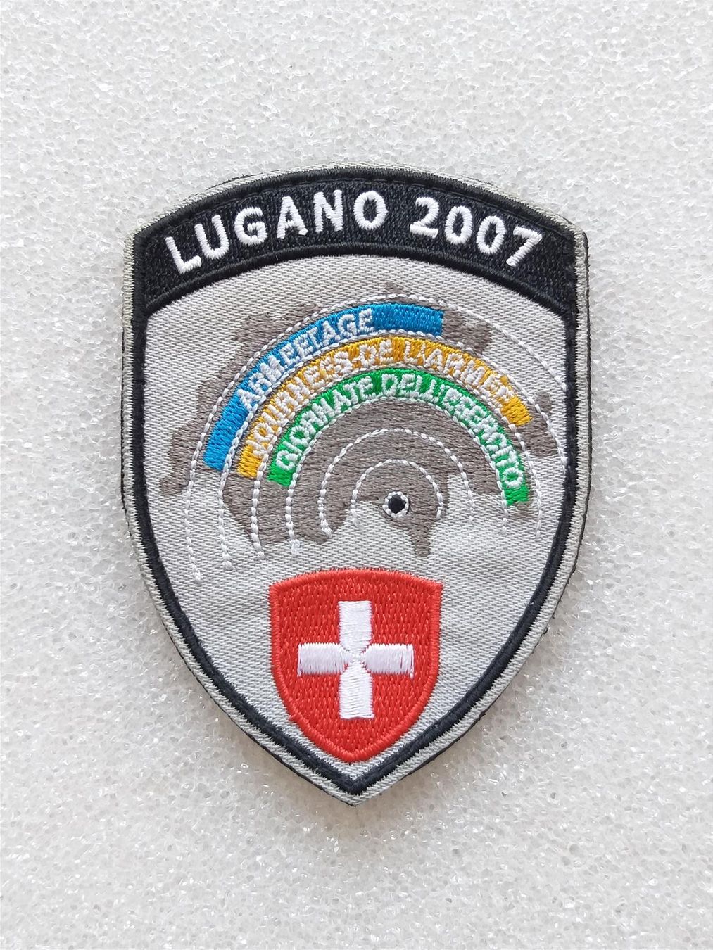 Plaketten & Abzeichen: Verbandsabzeichen LUGANO 2007 ARMEETAGE – Gebraucht aus Bauma von SwissMilitaria