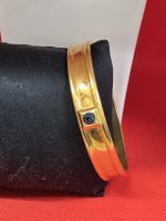 Armreif vergoldet mit blauem Stein guter Zustand