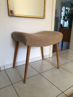 Hocker mit Stoffsitzfläche