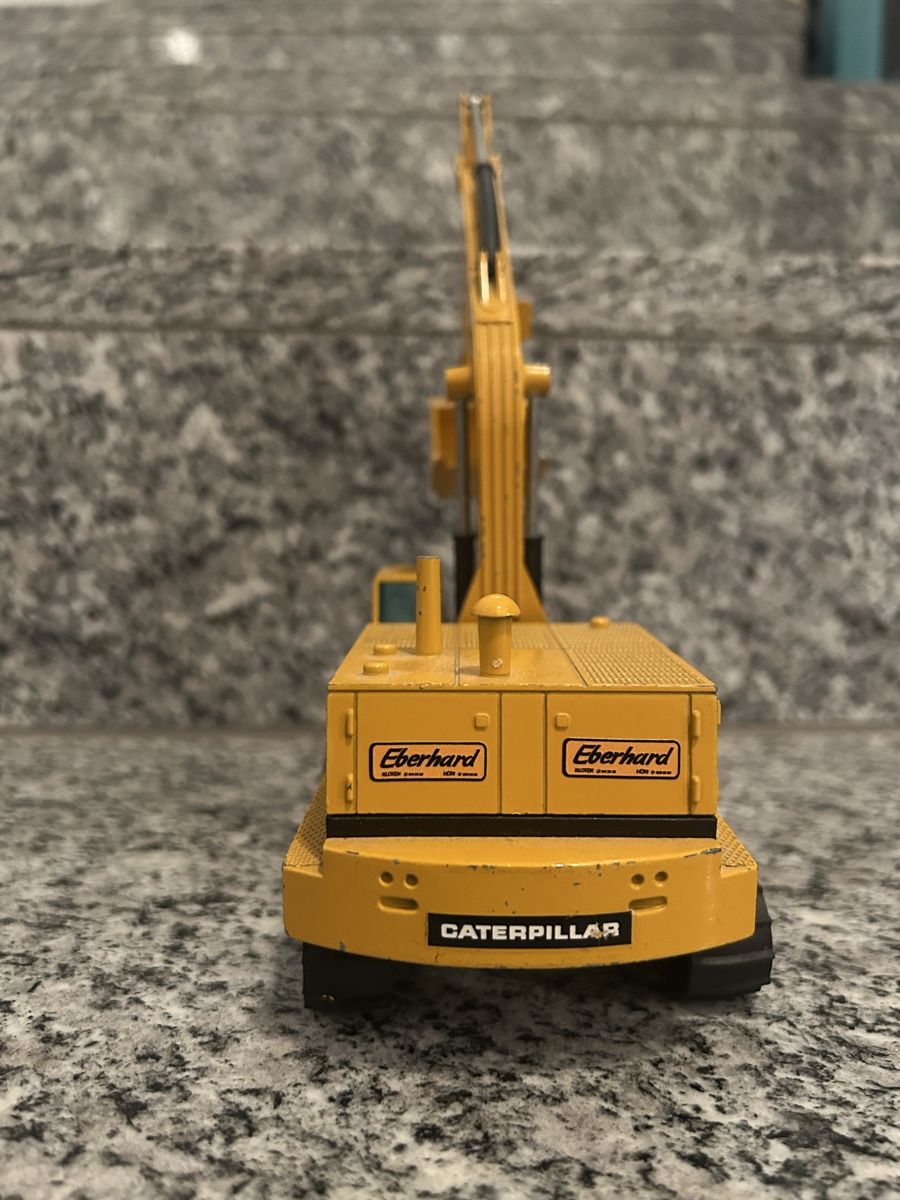 Caterpillar Kit di modellismo & Modellini statici: Caterpillar 245, 1:50 , NZG – Usato da Horw venduto da Tigercat635 1