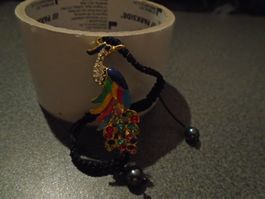 Armband schwarz, Vogel farbig
