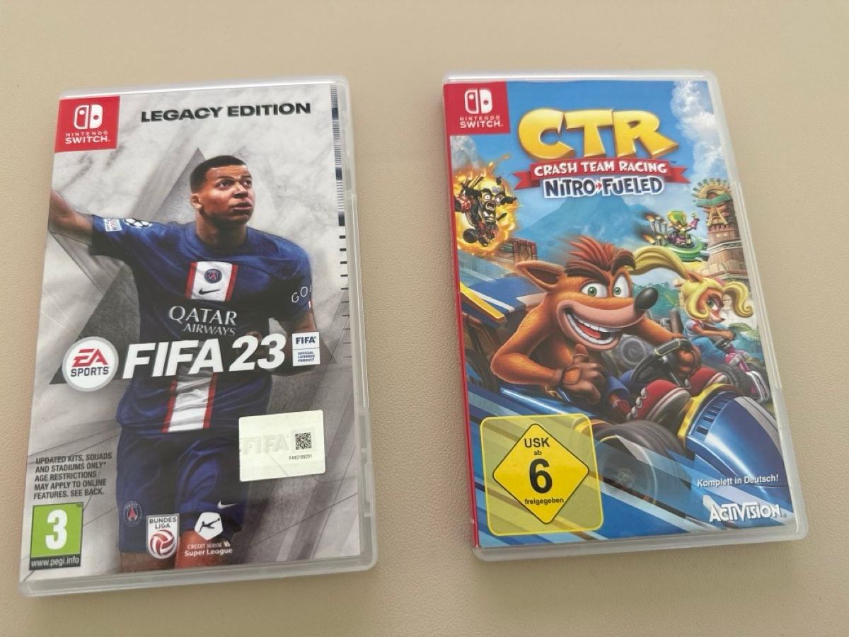 Nintendo Jeux: Case ohne Spiele Nintendo Switch FIFA 23 & CTR Crash Team – D'occasion à Steinach par Giusep7